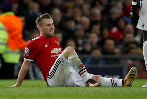 Manchester United's Luke Shaw lies injured.