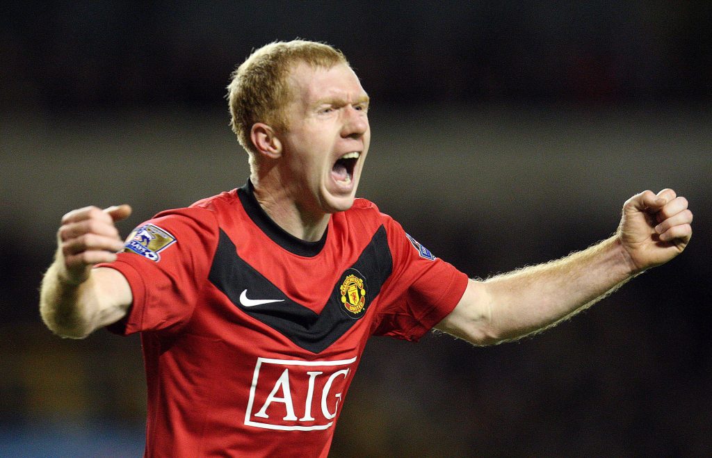 Paul Scholes celebrates after scoring Manchester United's first goal.