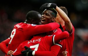 Manchester United's Alexis Sanchez celebrates scoring their second goal with Romelu Lukaku, Paul Pogba and teammates.