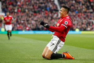 Manchester United's Alexis Sanchez celebrates scoring their second goal.
