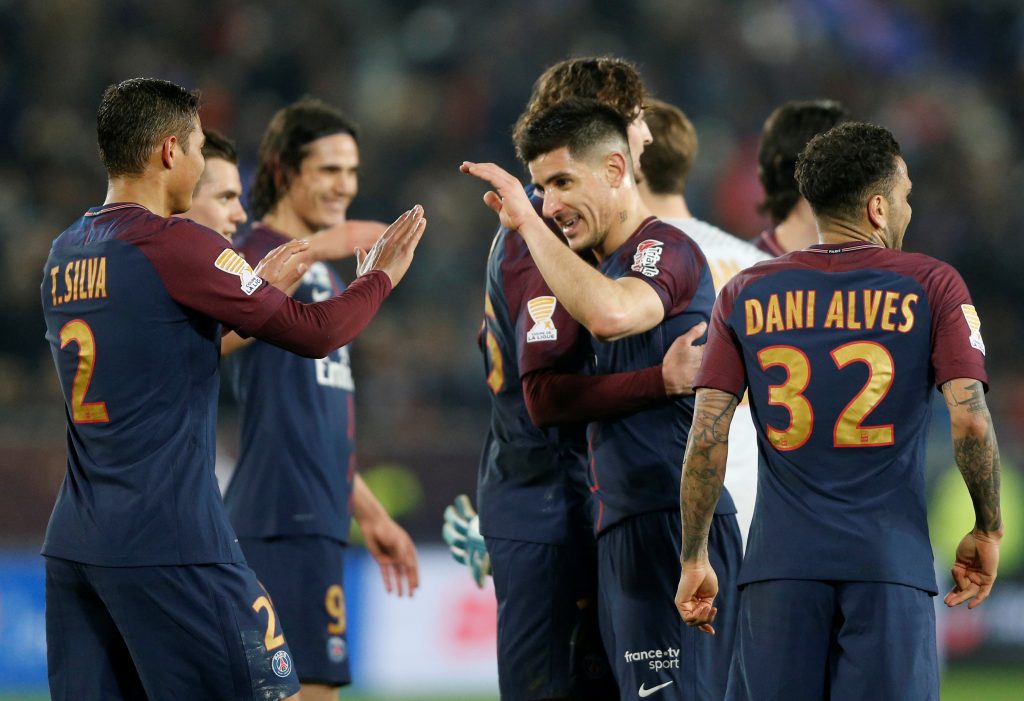 PSG's Thiago Silva celebrates with Thiago Motta after the match.