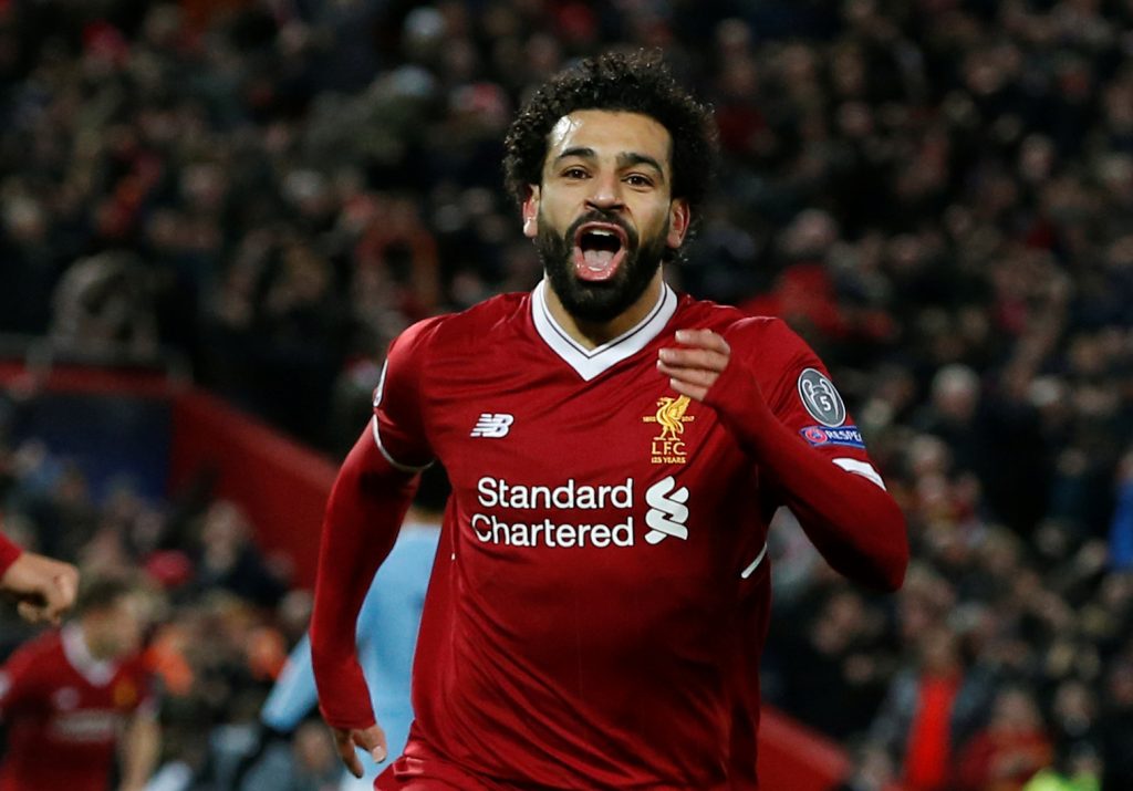 Liverpool's Mohamed Salah celebrates scoring their first goal.