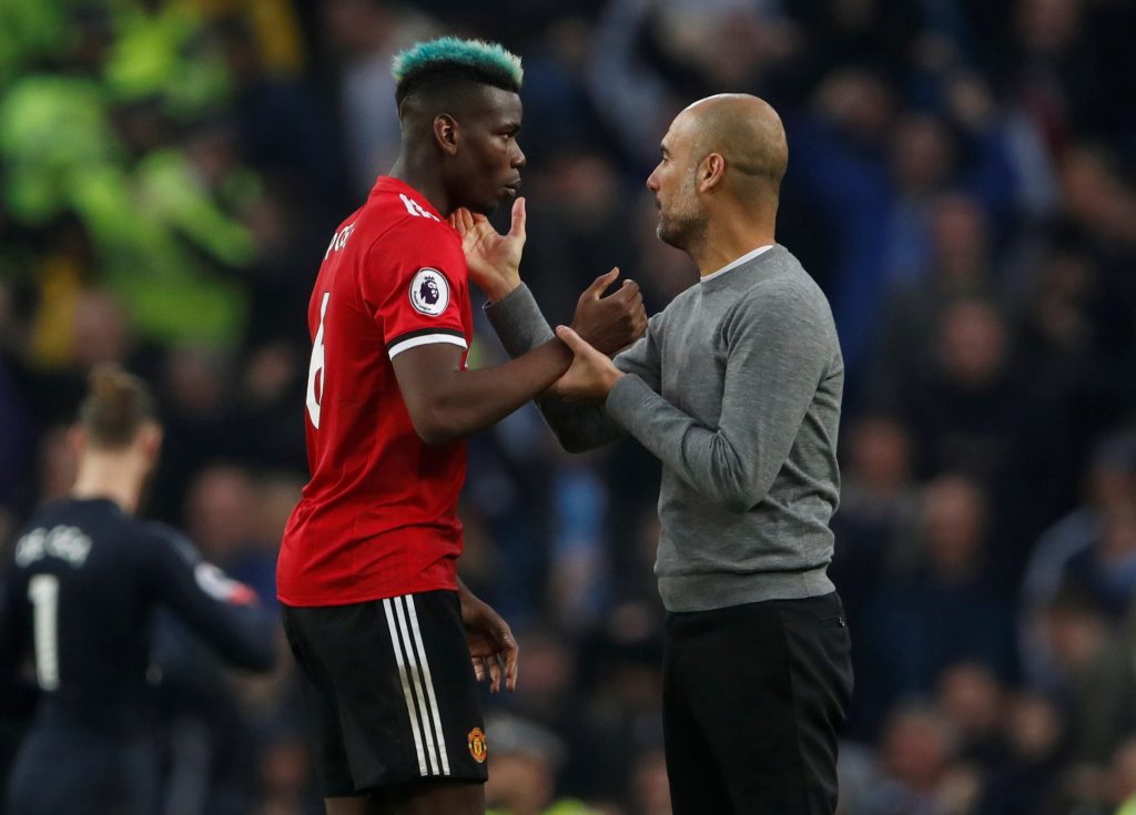 City manager Pep Guardiola and United's Paul Pogba after the match.