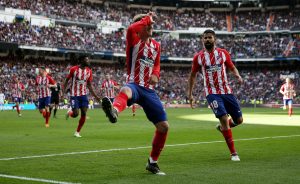Atletico Madrid's Antoine Griezmann celebrates scoring their first goal.