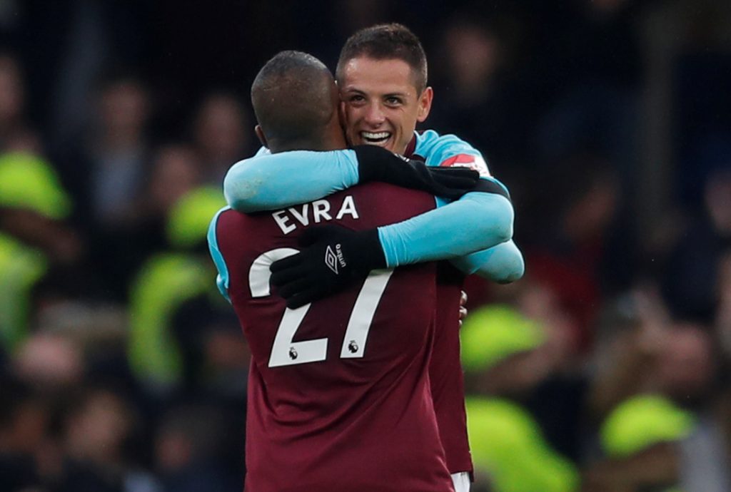 West Ham United's Javier Hernandez and Patrice Evra celebrate after the match.