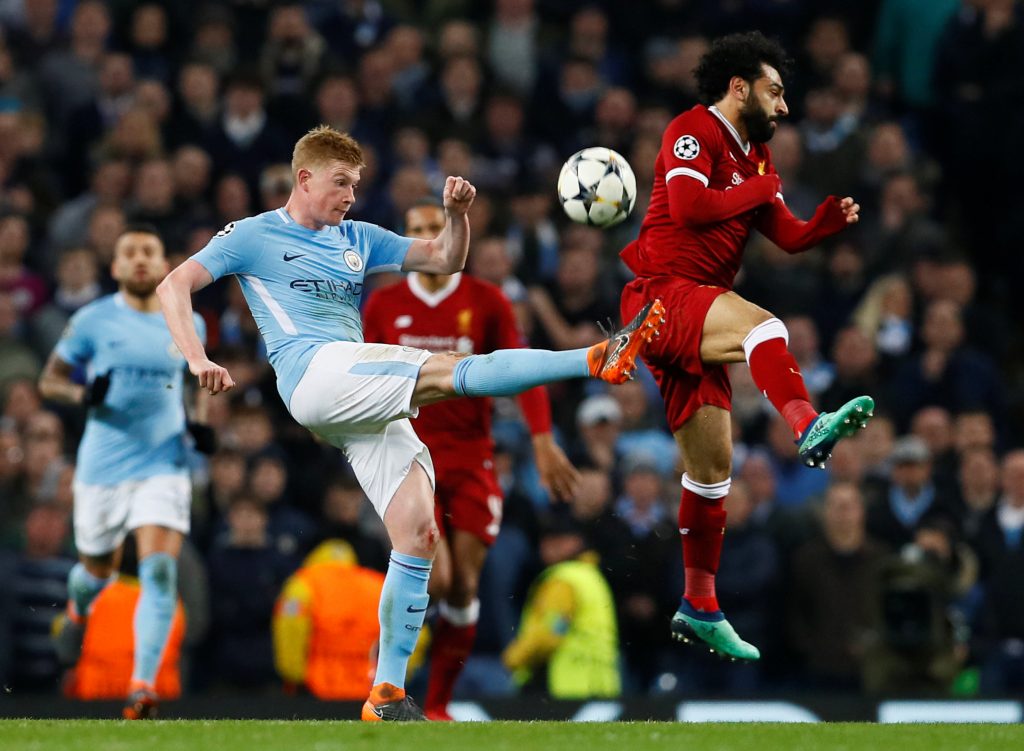Man City's Kevin De Bruyne in action with Liverpool's Mohamed Salah.