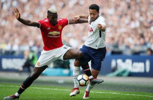 Tottenham's Mousa Dembele in action with Paul Pogba.