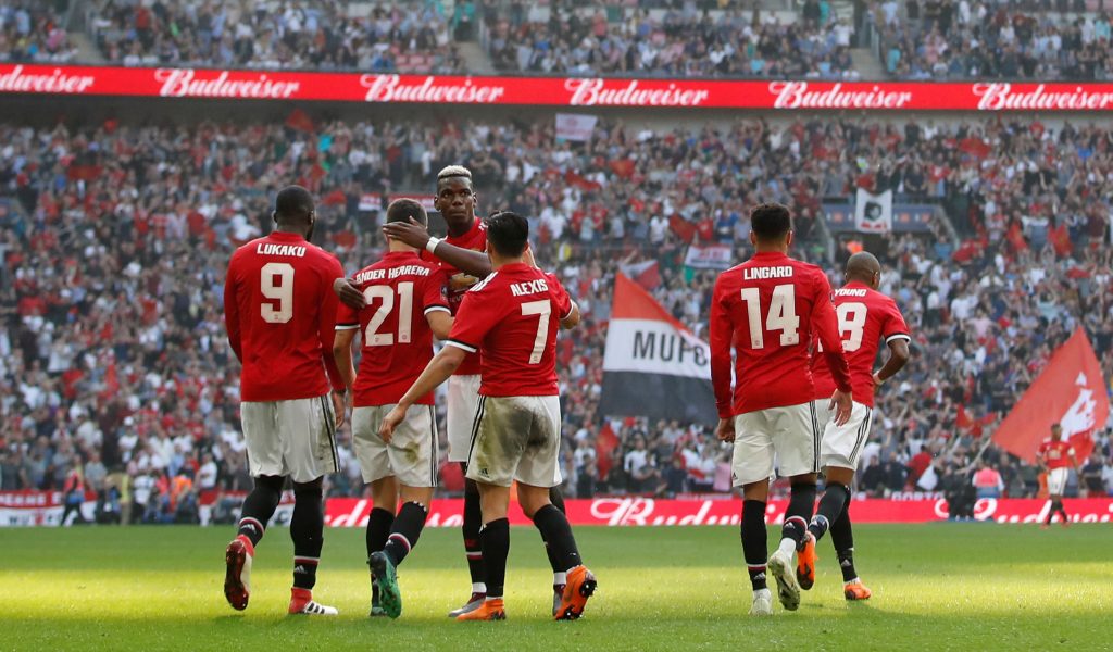 Manchester United's Ander Herrera celebrates scoring their second goal with teammates.