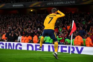 Atletico Madrid's Antoine Griezmann celebrates against Arsenal.