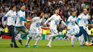 Real Madrid's Sergio Ramos, Karim Benzema and Marcelo and teammates celebrate after the match.