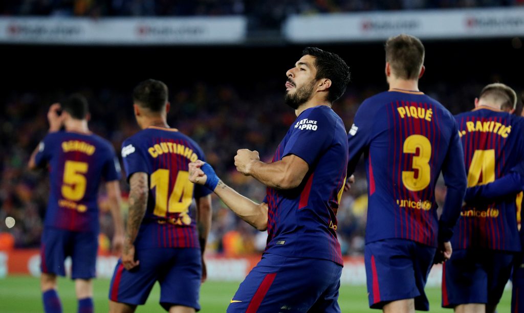 Barcelona's Luis Suarez celebrates scoring their first goal.