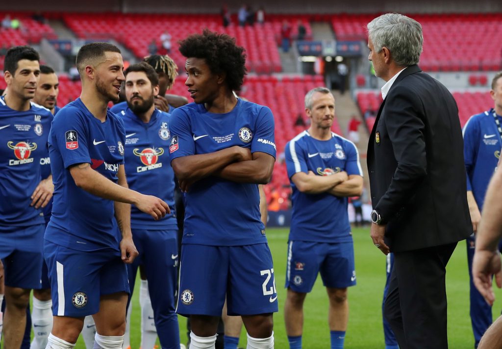 Jose Mourinho with Chelsea's Willian, Eden Hazard and team mates at the end of the match.