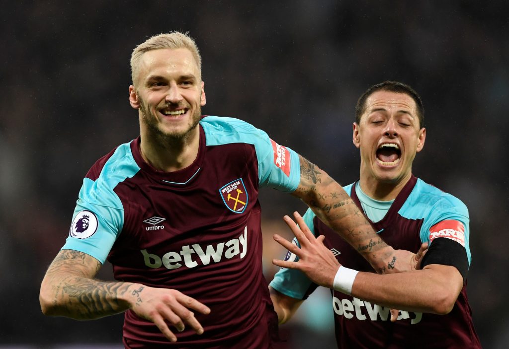 West Ham United's Marko Arnautovic celebrates scoring their second goal with Javier Hernandez.