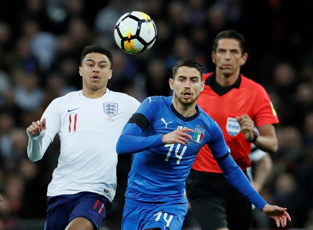 Englands Jesse Lingard in action with Italys Jorginho.