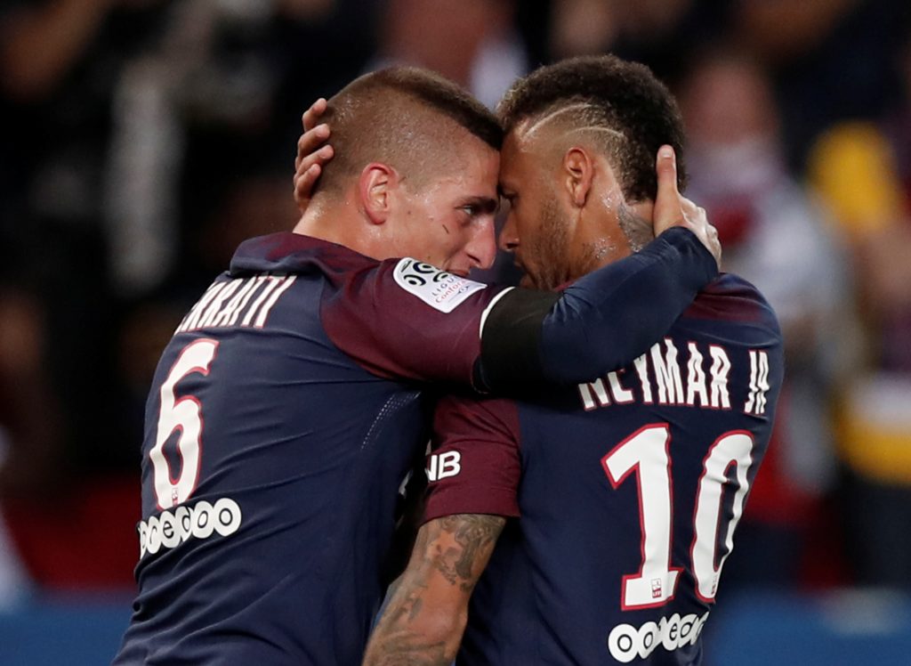 Paris Saint-Germains Neymar celebrates scoring their first goal with Marco Verratti.