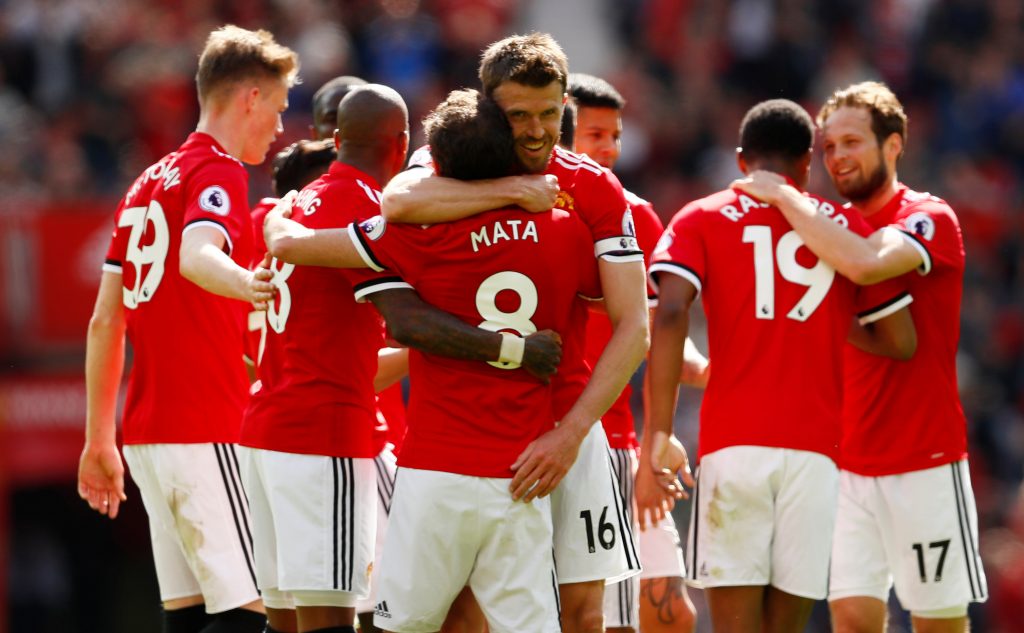 Manchester United's Marcus Rashford celebrates scoring their first goal with Manchester United's Michael Carrick, Juan Mata and team mates.