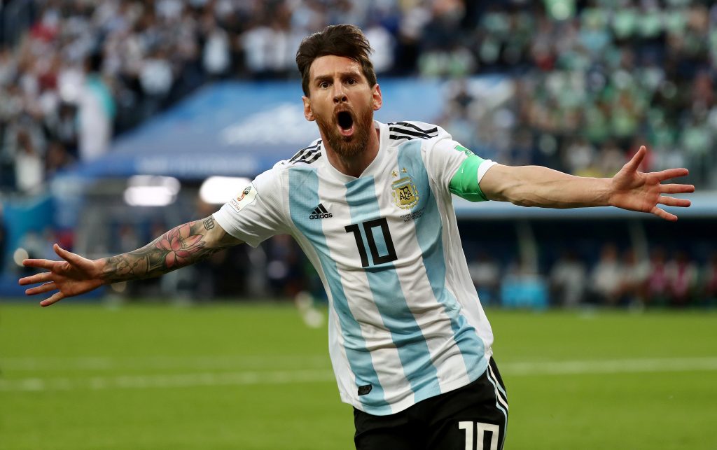 Argentina's Lionel Messi celebrates scoring their first goal.