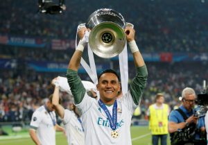 Real Madrid's Keylor Navas celebrates with the trophy after winning the Champions League.
