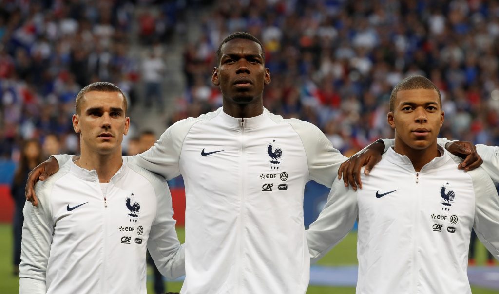 France's Antoine Griezmann, Paul Pogba and Kylian Mbappe before the match.