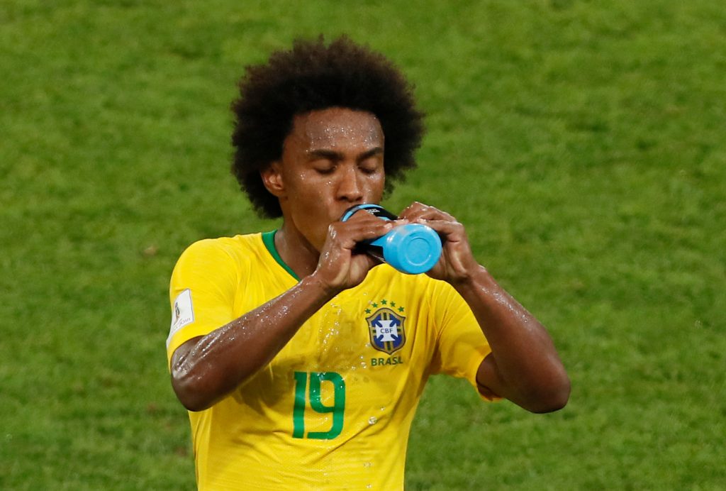 Brazil's Willian takes a drink.