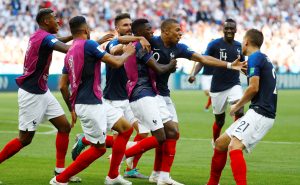 France's Kylian Mbappe celebrates with team mates after scoring their fourth goal.