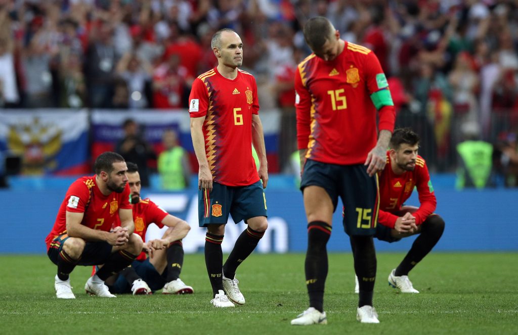 Spain's Sergio Ramos and Andres Iniesta look dejected after losing the penalty shootout.
