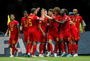 Belgium players celebrate after Kevin De Bruyne scores their second goal.