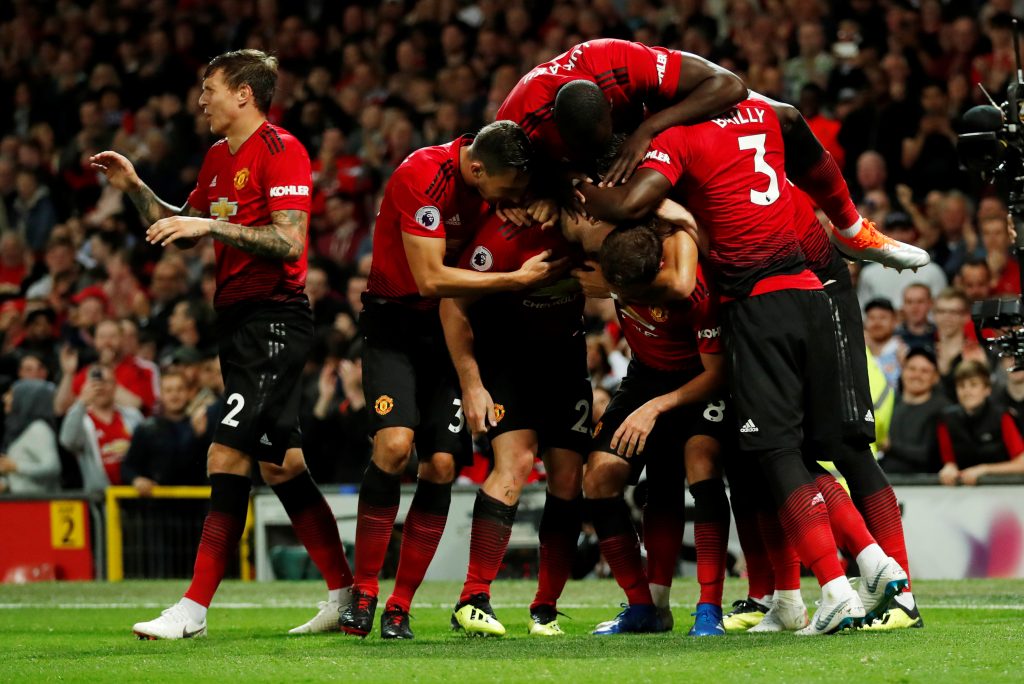 Manchester United's Luke Shaw celebrates scoring their second goal with team mates.