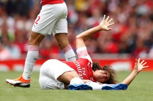 Arsenal's Matteo Guendouzi after sustaining an injury.