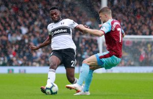 Fulham's Timothy Fosu-Mensah in action with Burnley's Johann Berg Gudmundsson.