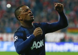 Patrice Evra celebrates after scoring a goal against Bayern Munich.
