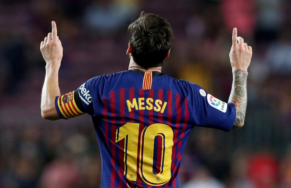 Barcelona's Lionel Messi celebrates scoring their third goal.