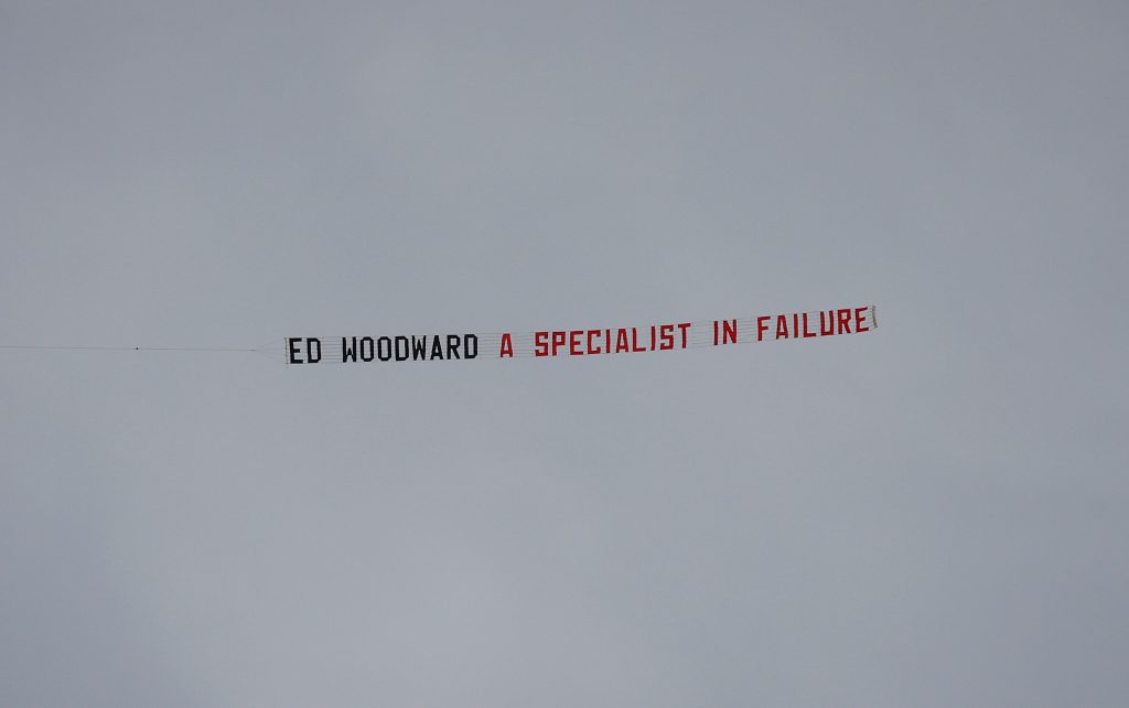 Plane banner referencing Manchester United chief executive Ed Woodward flown over the stadium before the match.