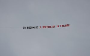 Plane banner referencing Manchester United chief executive Ed Woodward flown over the stadium before the match.