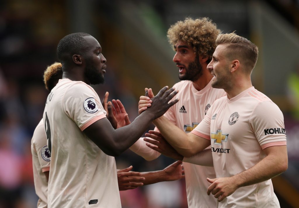 Manchester United's Romelu Lukaku celebrates scoring their first goal with Luke Shaw.
