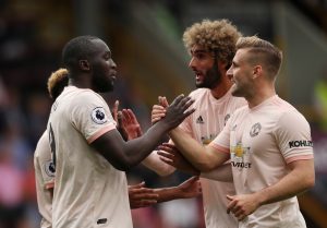 Manchester United's Romelu Lukaku celebrates scoring their first goal with Luke Shaw.