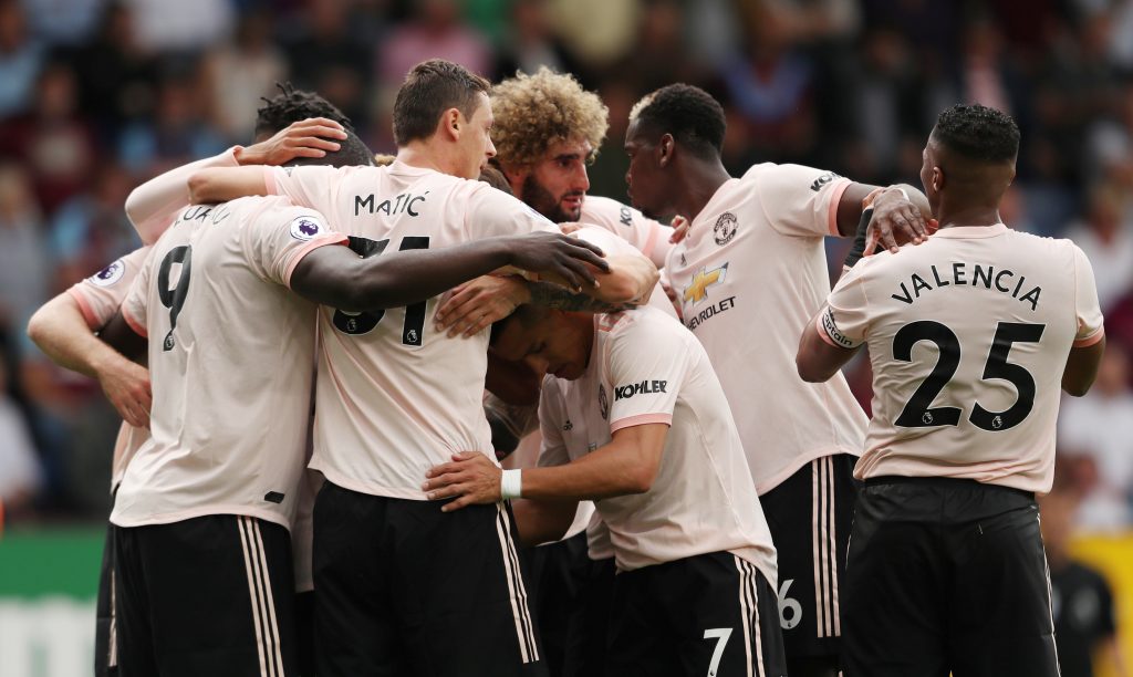 Manchester United's Romelu Lukaku celebrates scoring their second goal with teammates.
