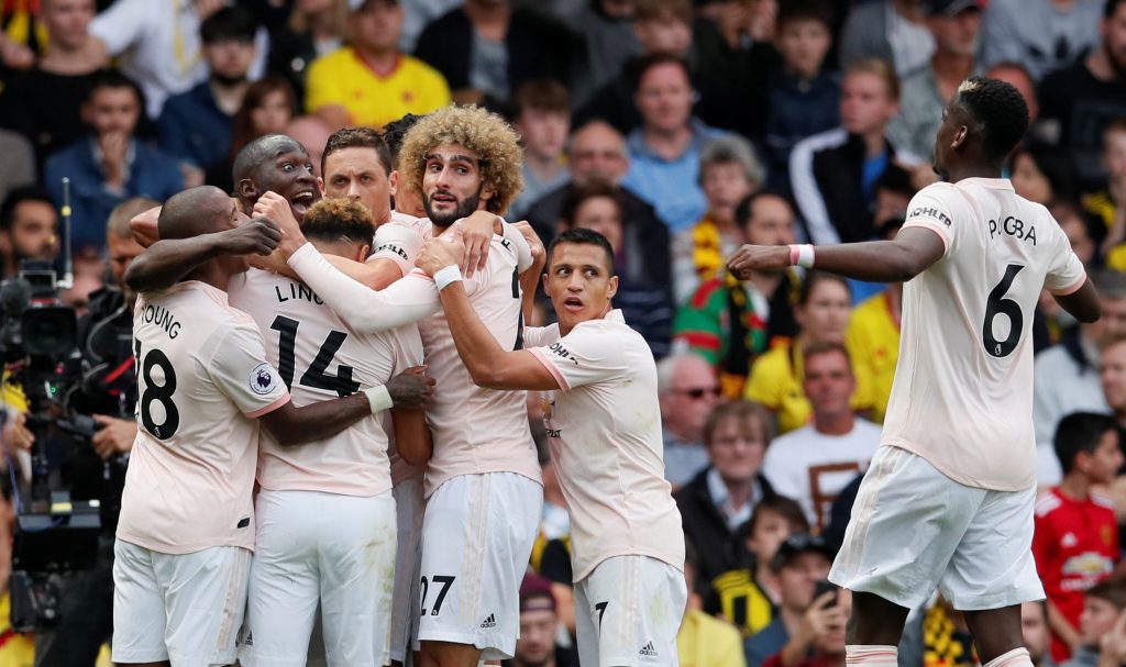Romelu Lukaku celebrates with teammates.