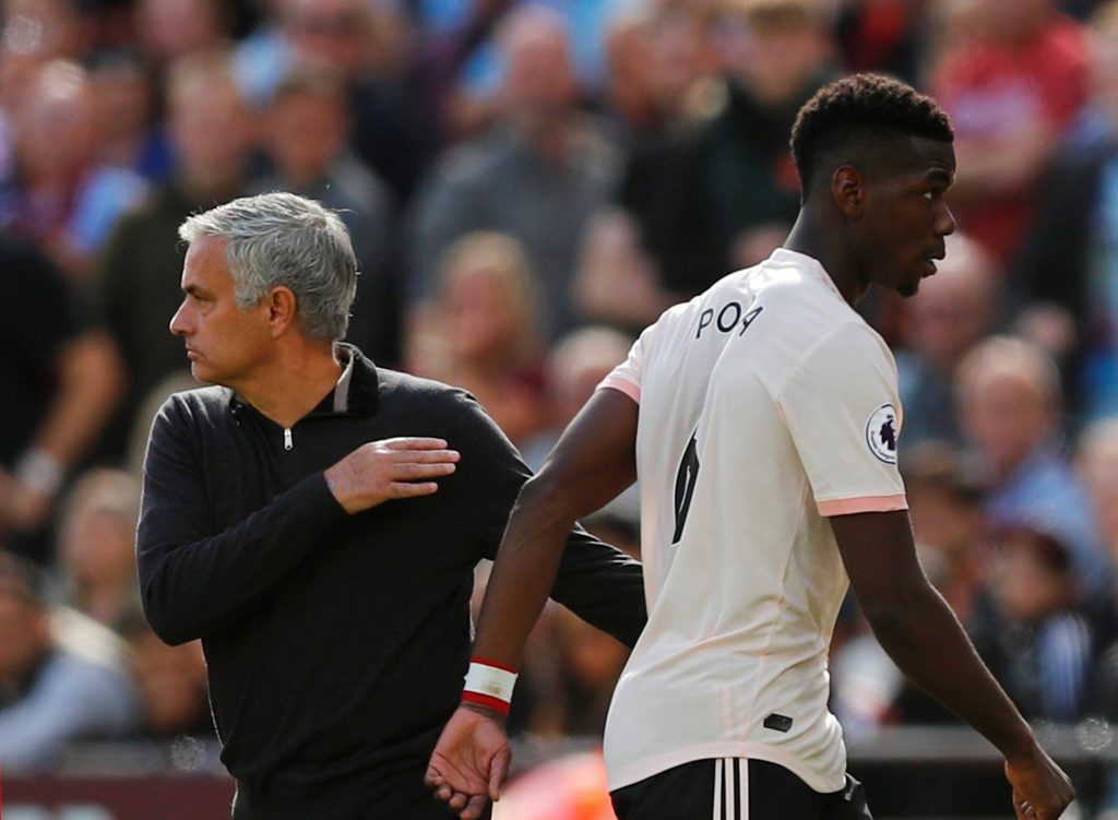 Paul Pogba with manager Jose Mourinho after being substituted off.