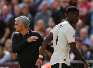 Paul Pogba with manager Jose Mourinho after being substituted off.