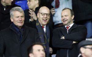 Manchester United former chief executive David Gill, co owner Avram Glazer and executive vice chairman Ed Woodward.
