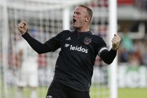 DC United striker Wayne Rooney (9) celebrates after scoring a goal.