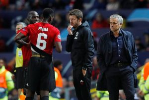 Jose Mourinho, coach Michael Carrick, Romelu Lukaku and Paul Pogba.