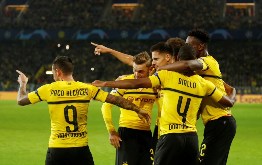 Borussia Dortmund's Paco Alcacer celebrates scoring their second goal with Abdou Diallo and team mates.