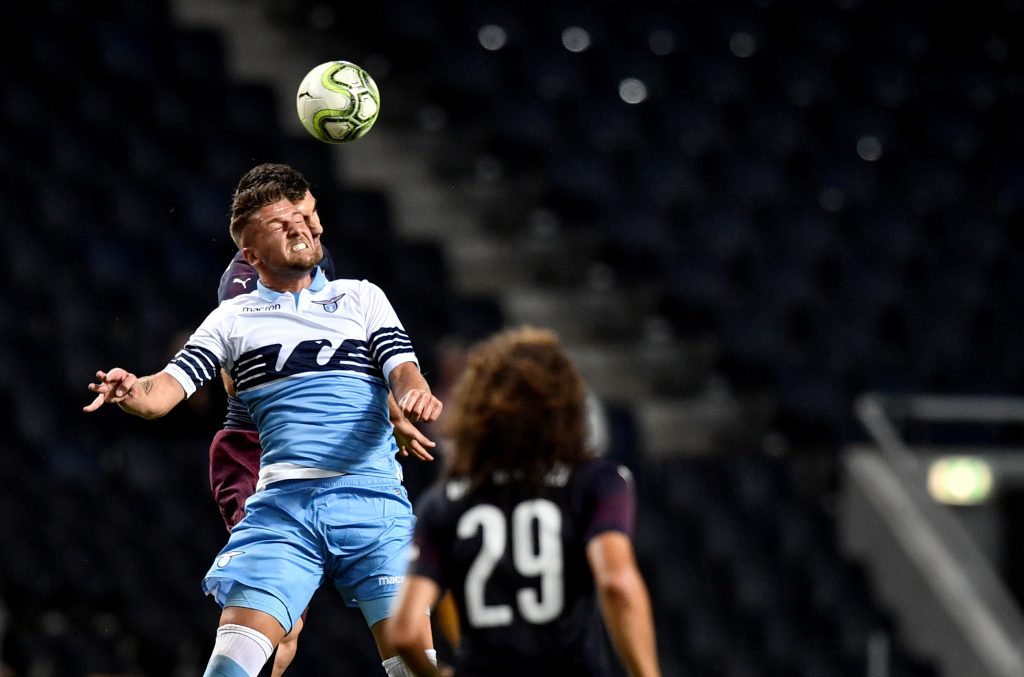 Lazio's Sergej Milinkovic-Savic heads the ball.