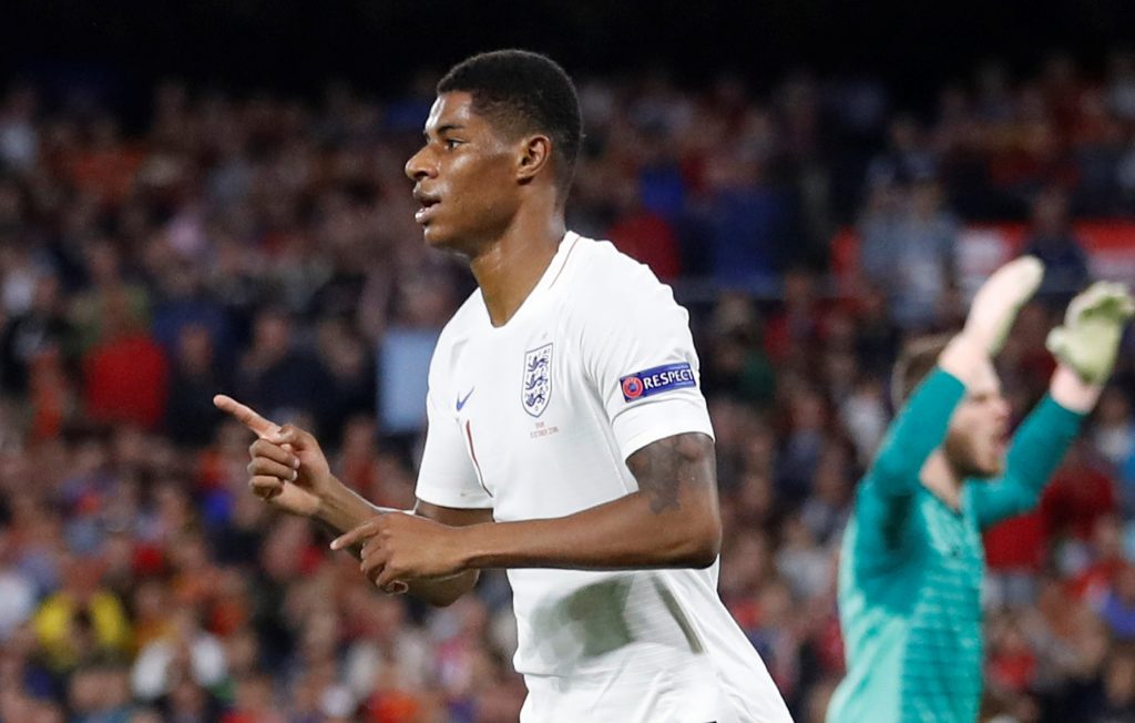 England's Marcus Rashford celebrates scoring their second goal.