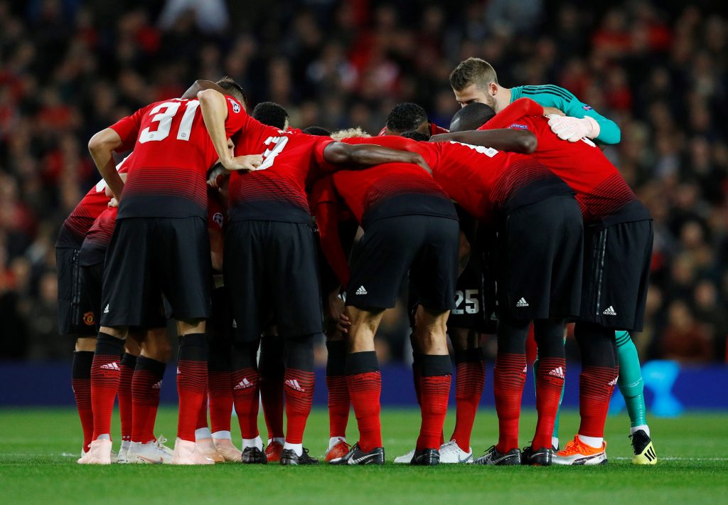 Manchester United team huddle before the match.