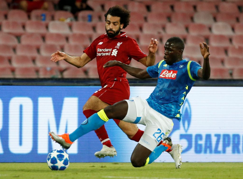 Liverpool's Mohamed Salah in action with Napoli's Kalidou Koulibaly.