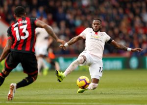 Bournemouth's Callum Wilson in action with Manchester United's Fred.