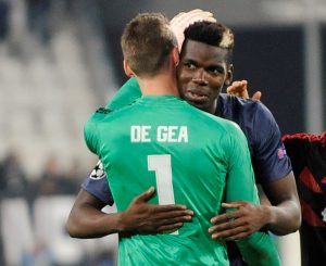 Manchester United's David de Gea and Paul Pogba celebrate after the match.